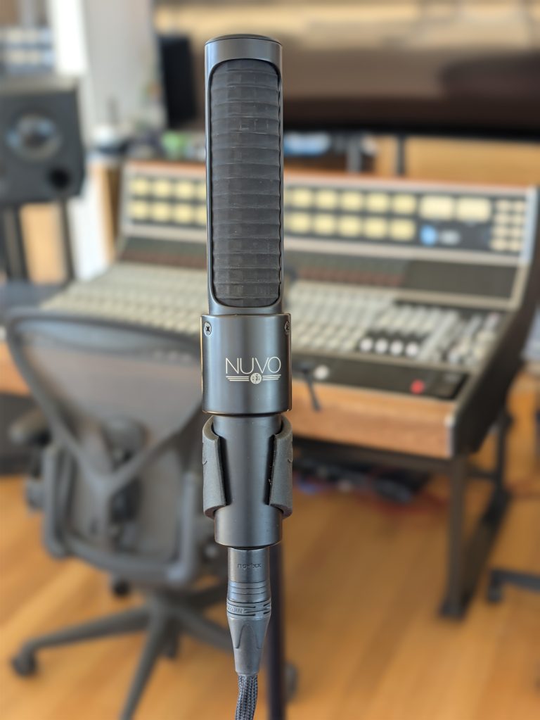 AEA Nuvo N8 ribbon microphone positioned in front of an API 2448 recording console
